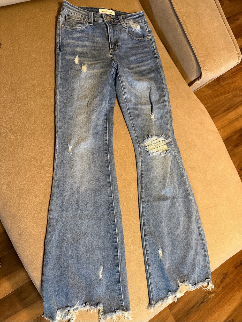 High-Rise Light Blue Distressed Flare Jeans - Women's
